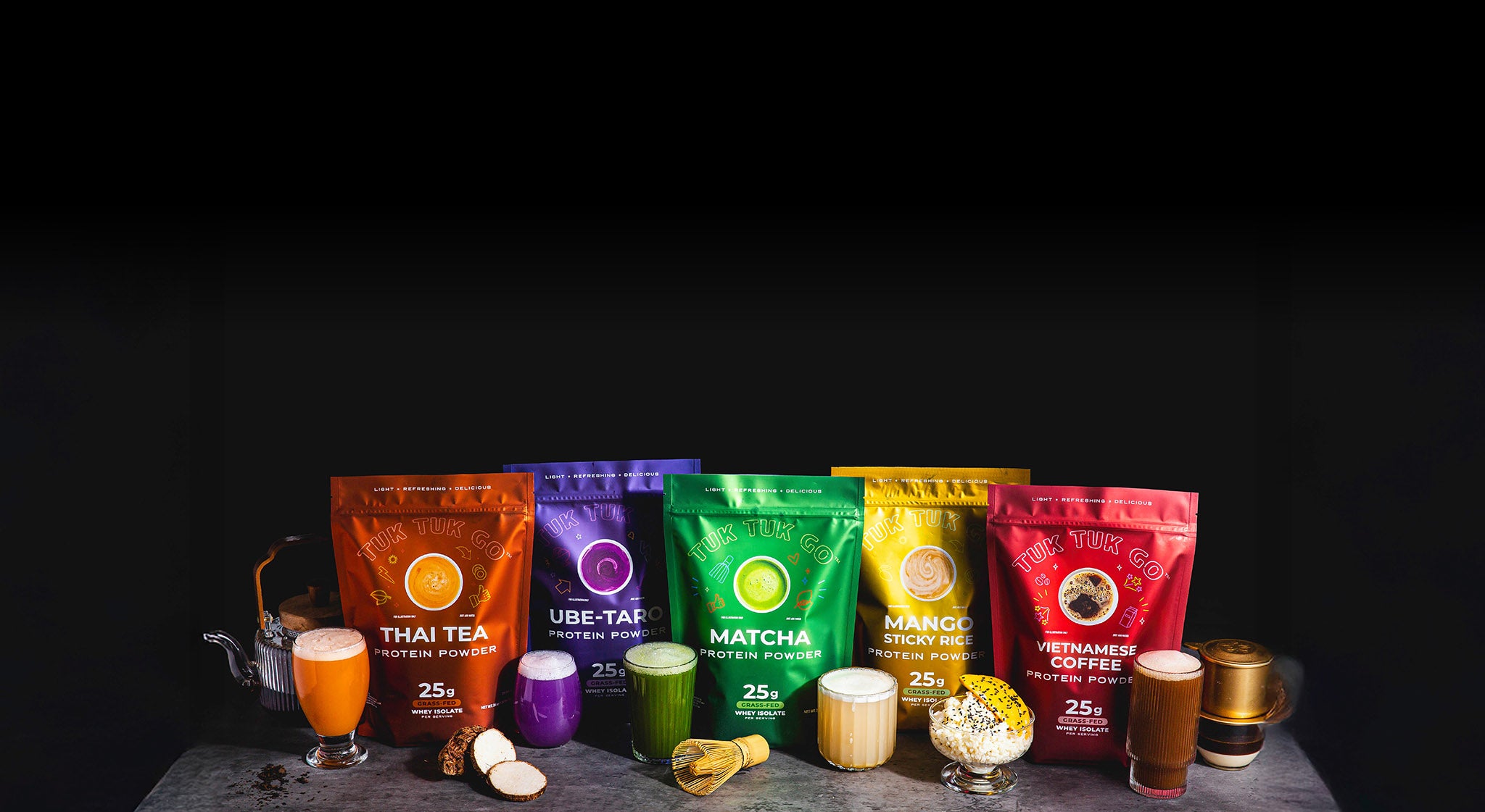 All five protein pouches with respective mixed protein drinks next to them